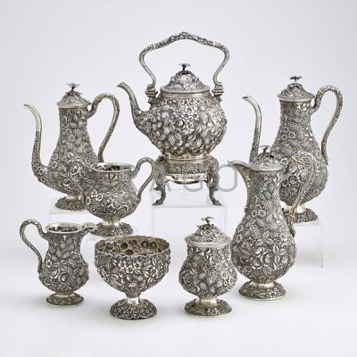 EIGHT PIECE STERLING REPOUSSE COFFEE SERVICE Bulbous or pear shaped