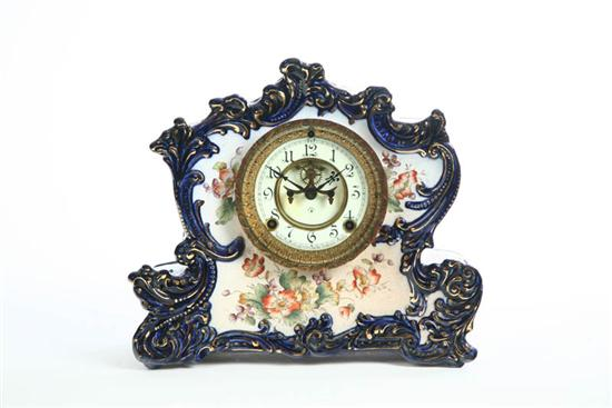 CHINA MANTLE CLOCK Time and strike clock with porcelain dial
