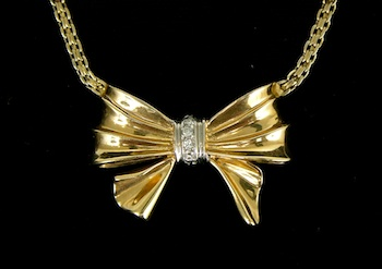 A Bow Shape Necklace with Diamonds 14k yellow gold chain