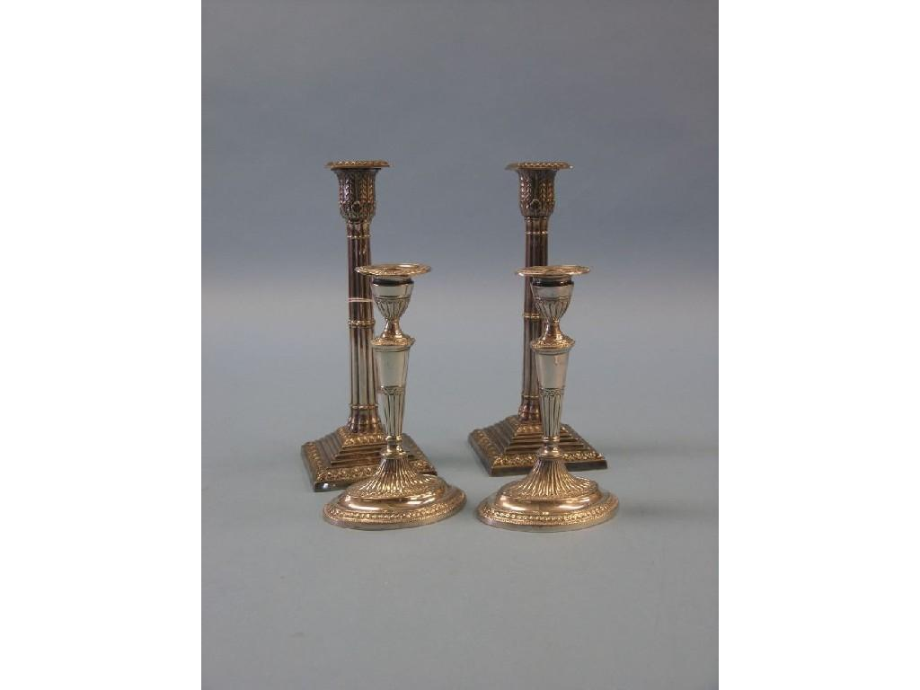 A pair of Victorian silver plated candlesticks reeded classical form