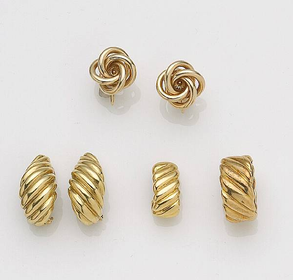 A collection of 18k and 14k gold jewelry including an