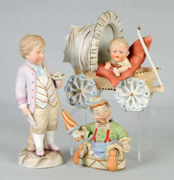 Lot of 3 Bisque Figurines Description German bisque baby holding