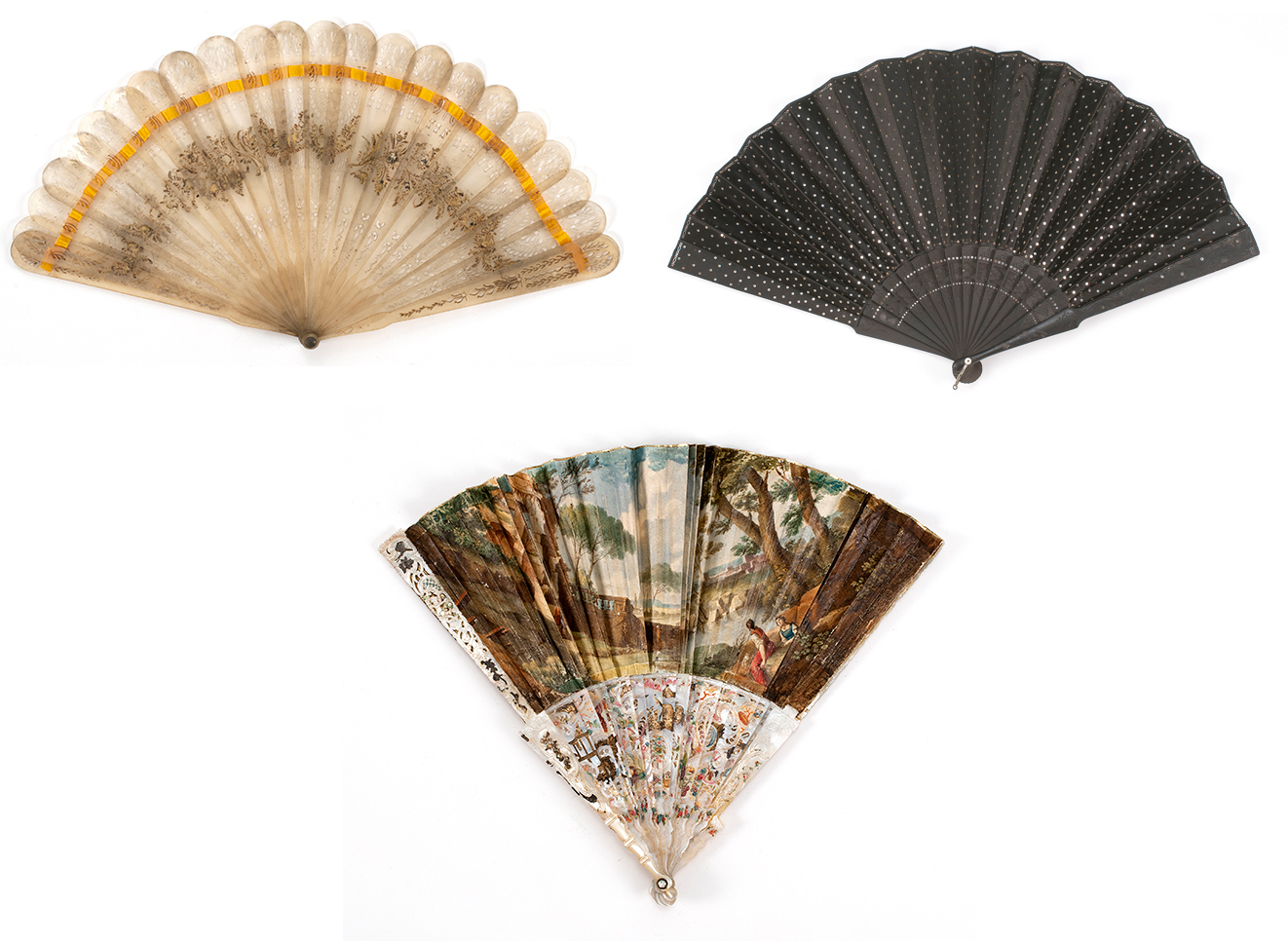 THREE ASSORTED FANS 1 Late 19th Century pierced bris fan