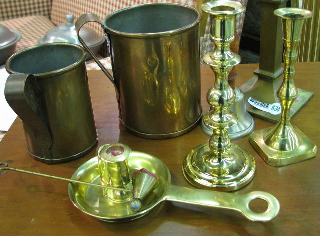 Group of vintage brass and copper decorator accessories including four