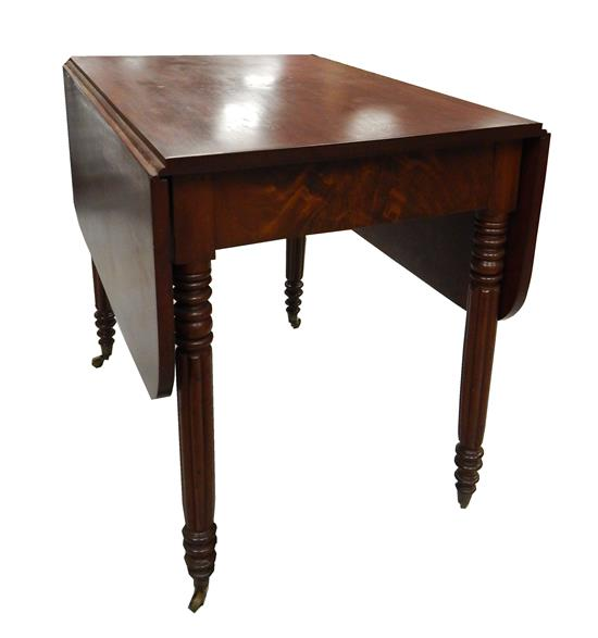 Early 20th C drop leaf table mahogany and mahogany veneer