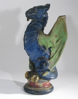A large Royal Doulton stoneware dragon finial designed by Gilbert