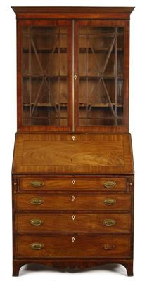 A late George III mahogany bureau bookcase inlaid stringing the