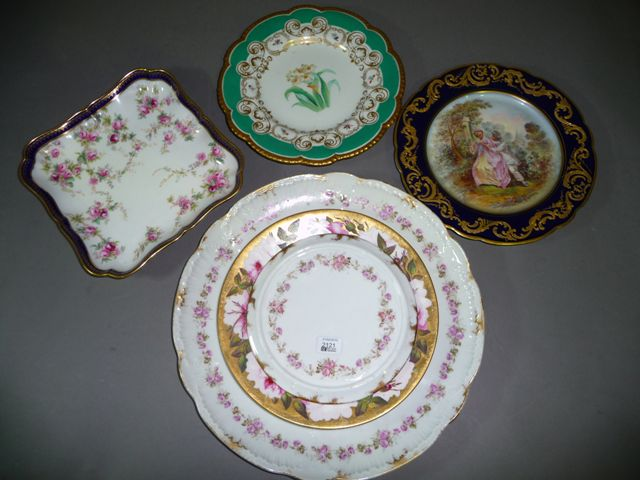 A 19th century English porcelain botanical study plate centrally painted