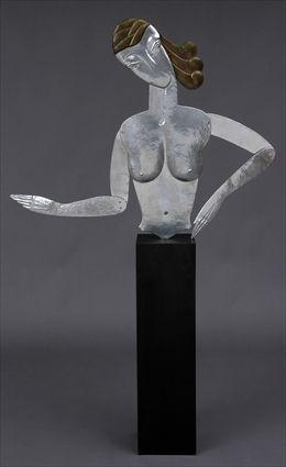 HAMMERED ALUMINUM RELIEF BUST OF A WOMAN IN THE MANNER