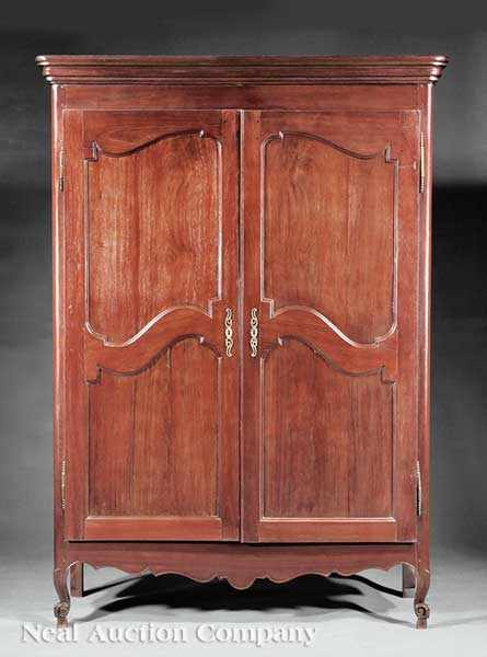 A West Indies Carved Courbaril Armoire in the Louis XV