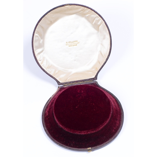 Carlo Giuliano A Victorian round maroon morocco covered necklace box
