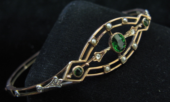 TSAVORITE GARNET SEED PEARL DIAMOND AND NINE KARAT GOLD BANGLE