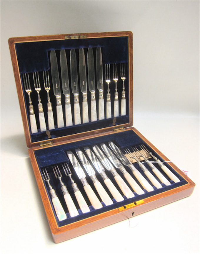MOTHER OF PEARL SILVER PLATED FLATWARE SET in storage chest