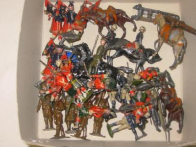 Eleven Britains metal Highland piping and fighting figures and twenty