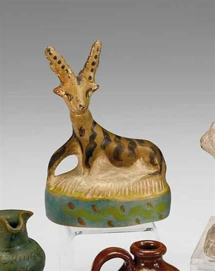 Painted chalkware kneeling figure of a deer probably pennsylvania 19th