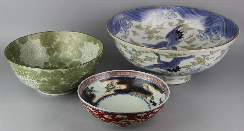 THREE JAPANESE LARGE BOWLS the first painted green cream gilt