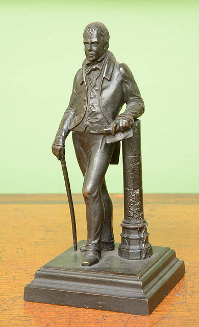 A 19TH CENTURY BRONZE SCULPTURE of Sir Walter Scott standing