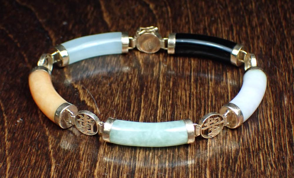 MULTI COLOR JADE AND FOURTEEN KARAT GOLD BRACELET The 7