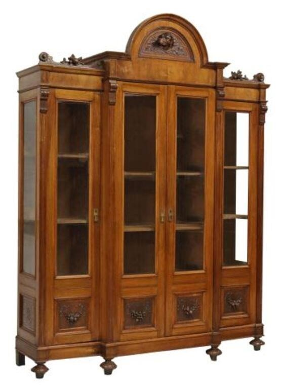 Italian carved breakfront bookcase 19th c having molded crest with