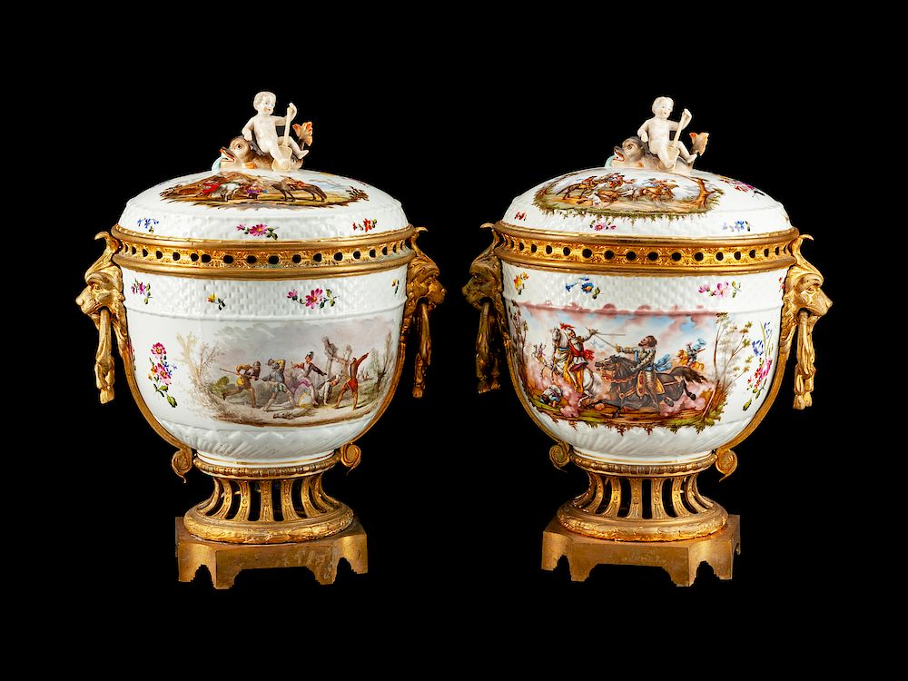 A Pair of Gilt Bronze Mounted German Porcelain Covered Urns