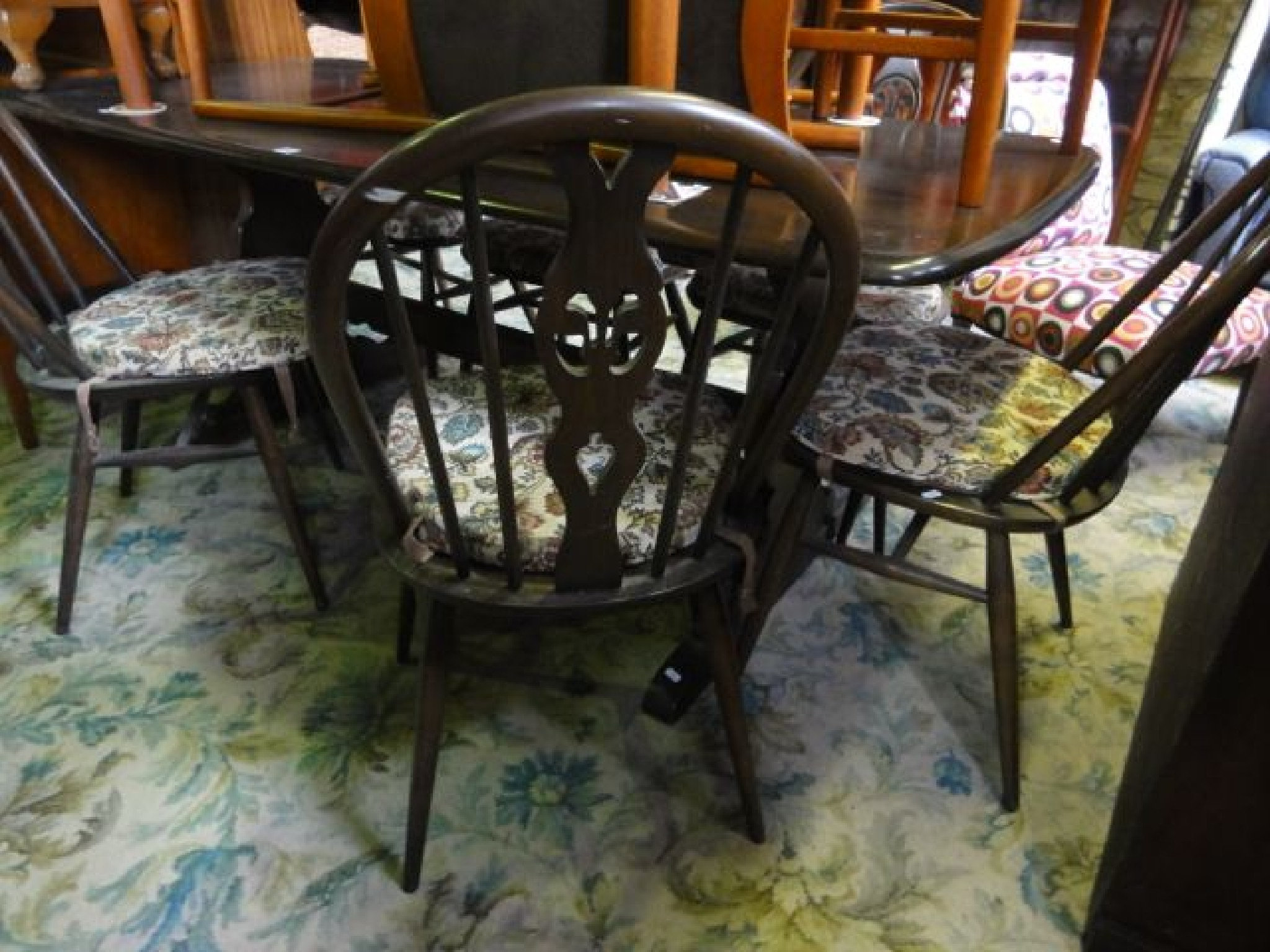 An Ercol dark stained elm refectory table of rectangular form