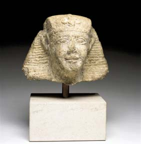 EGYPTIAN LIMESTONE HEAD Well carved Egyptian limestone head wearing the