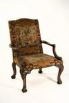 CHAIR Late 19th C Georgian style walnut lolling chair Upholstered