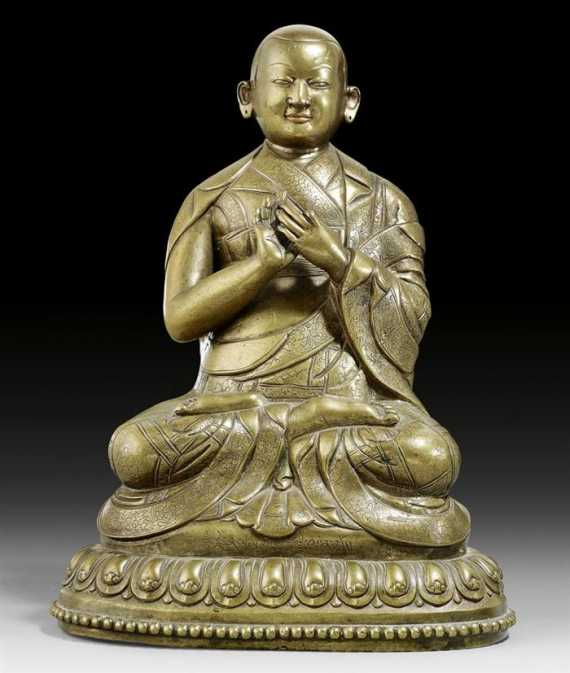 A FINE BRONZE FIGURE OF LAMA rJe Nam Kha i