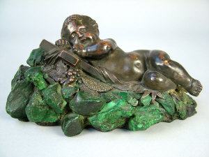 A mid 19th century Russian bronze figure of an infant