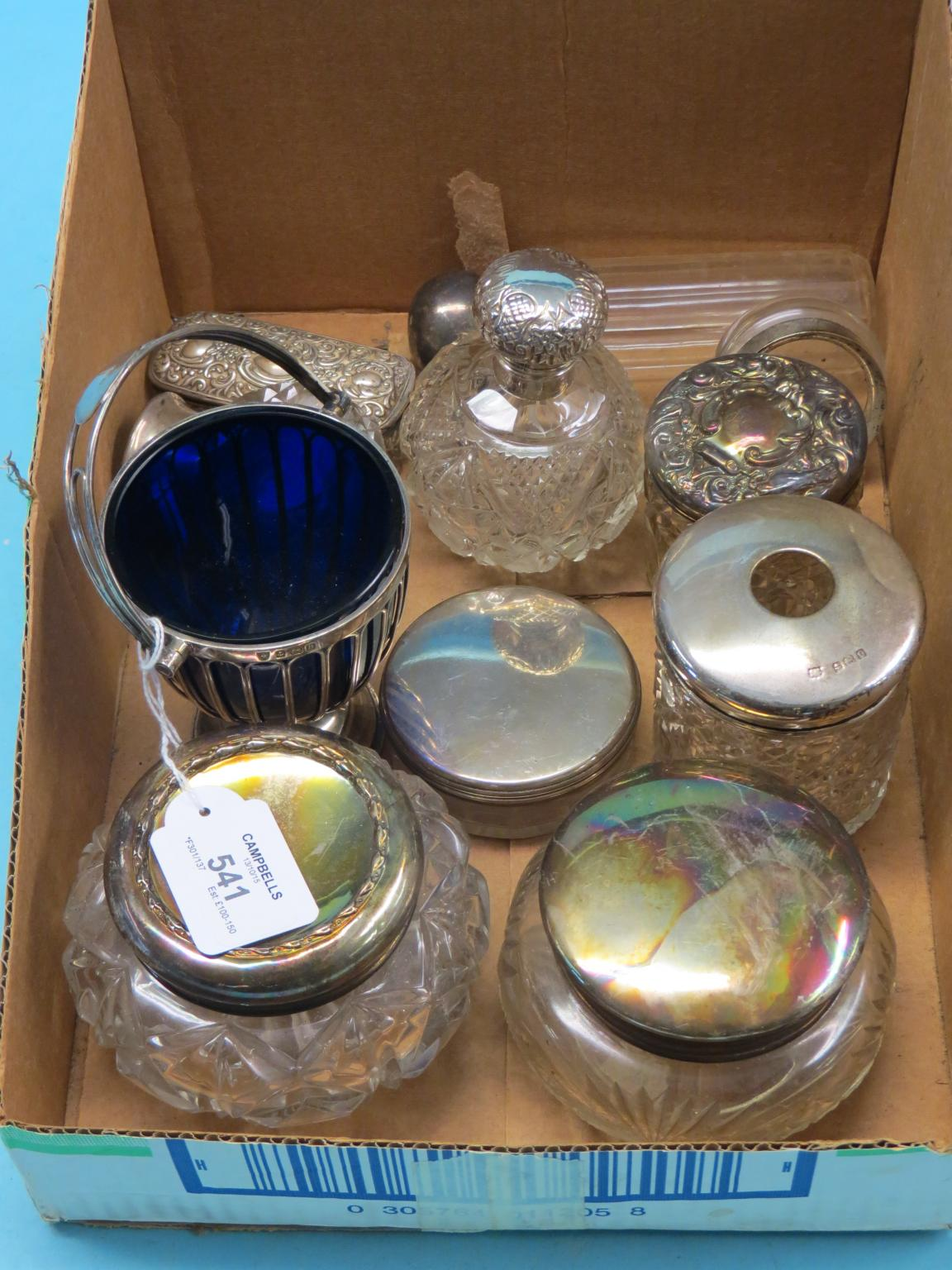 A silver pedestal bon bon dish with blue glass liner