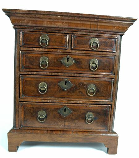 An 18th century style burr walnut and herring bone banded