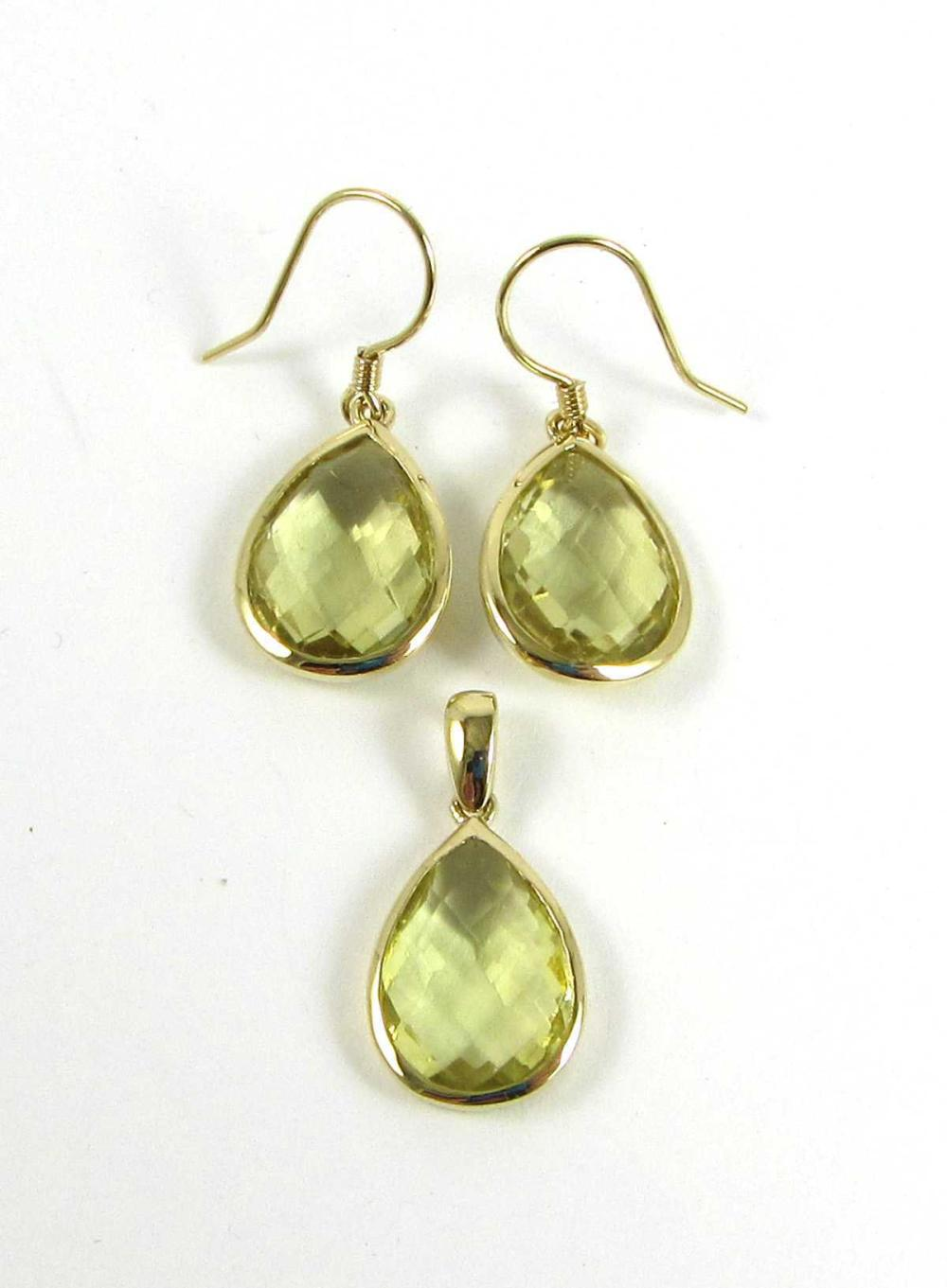 CITRINE AND FOURTEEN KARAT GOLD EARRING AND PENDANT SET including