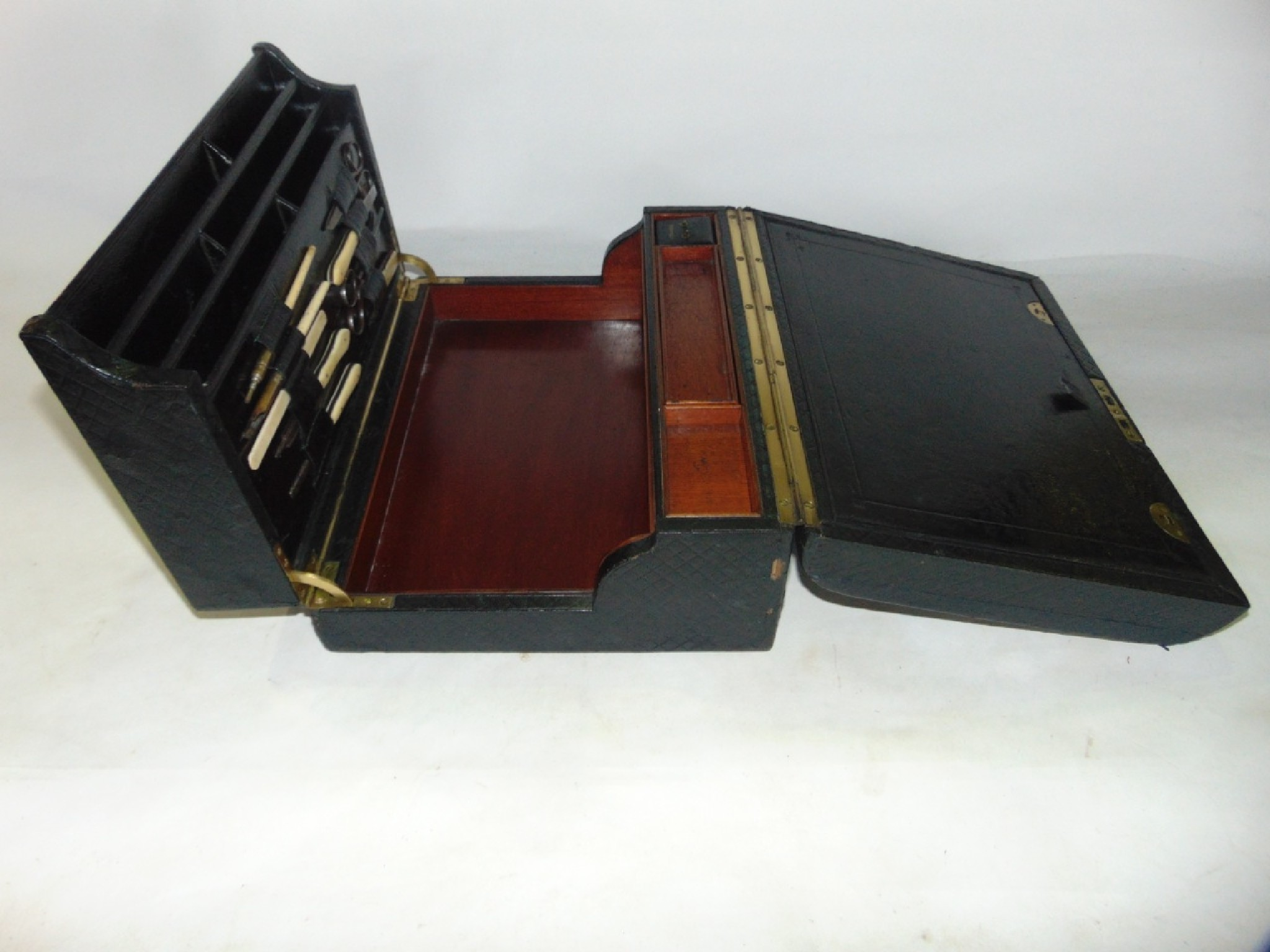 A good quality Victorian writing case clad in dark stained