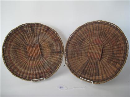 Two Hopi coiled basket trays early 20th century Each decoarted