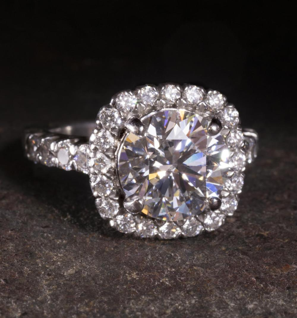 ESTATE RITANI SIGNED DIAMOND AND PLATINUM RING WITH APPRAISAL GRADING