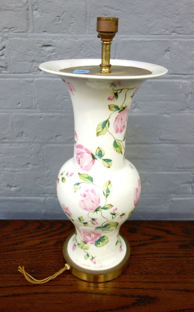 A modern porcelain baluster vase shaped table lamp painted with