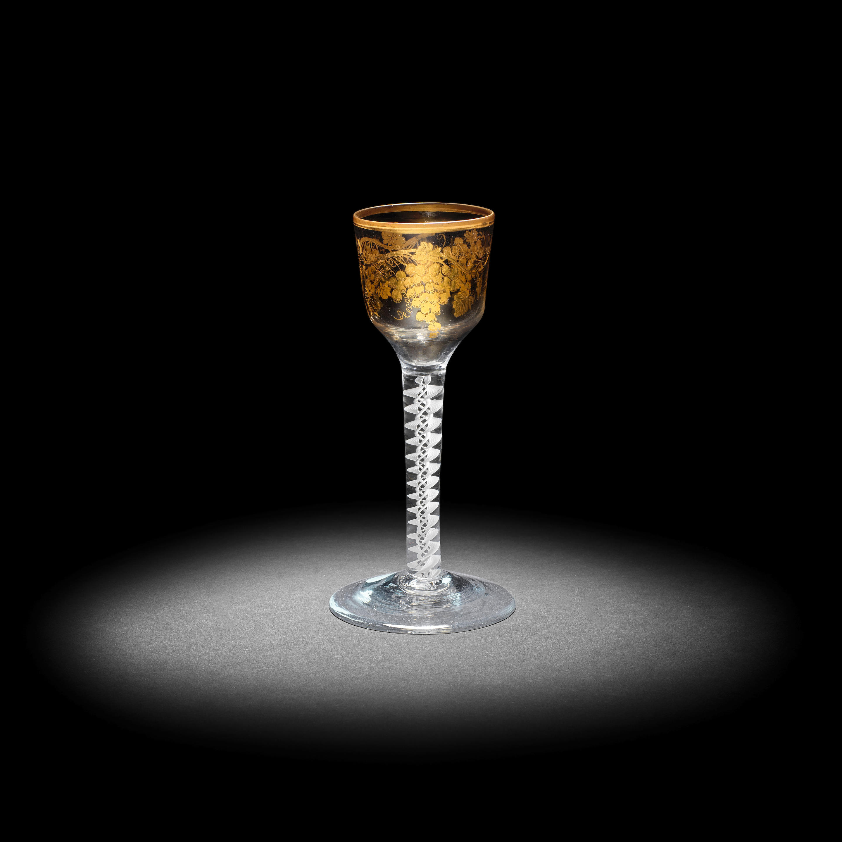 A GOOD GILDED OPAQUE TWIST WINE GLASS CIRCA 1765 Decorated
