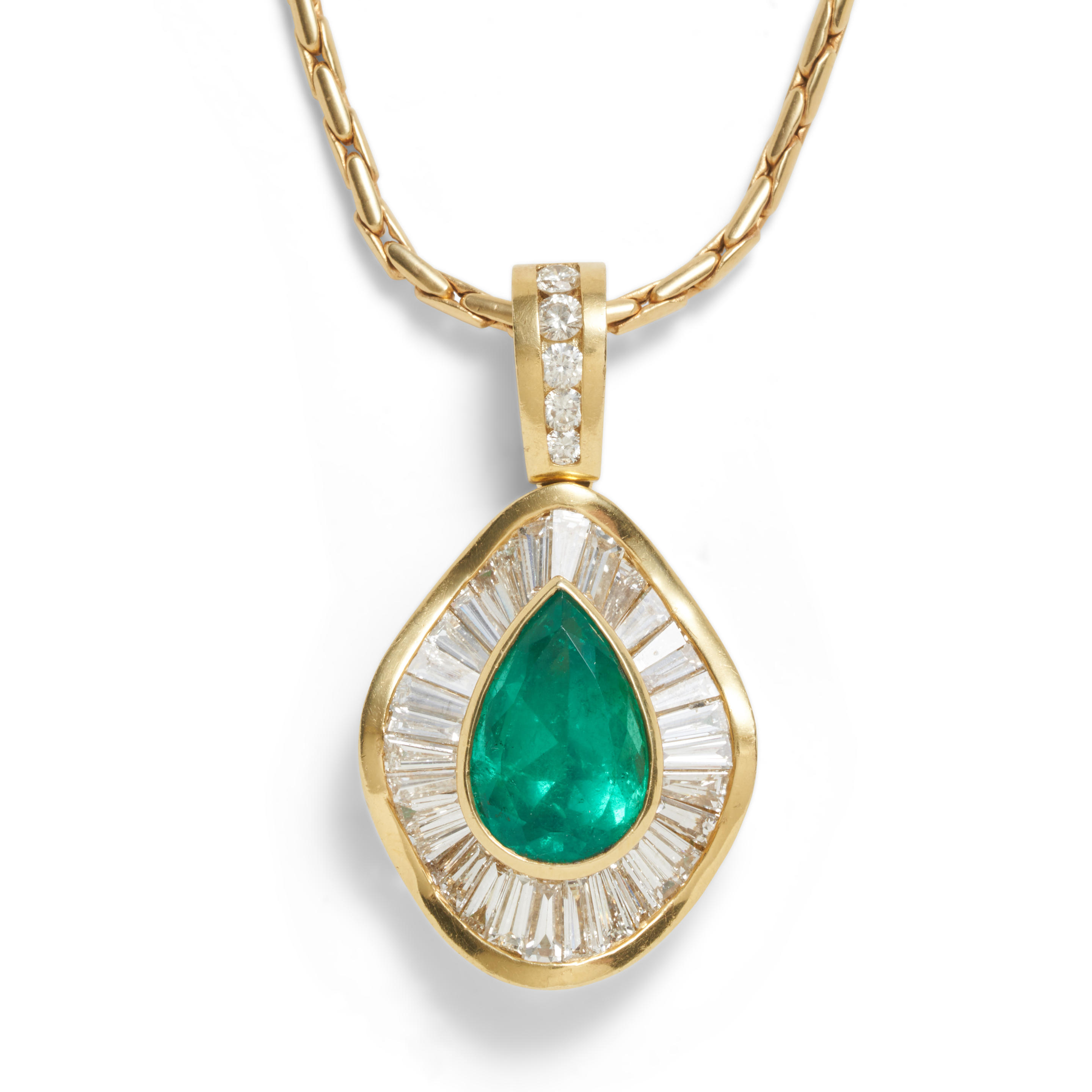 AN 18K GOLD EMERALD AND DIAMOND PENDANT Bezel set with