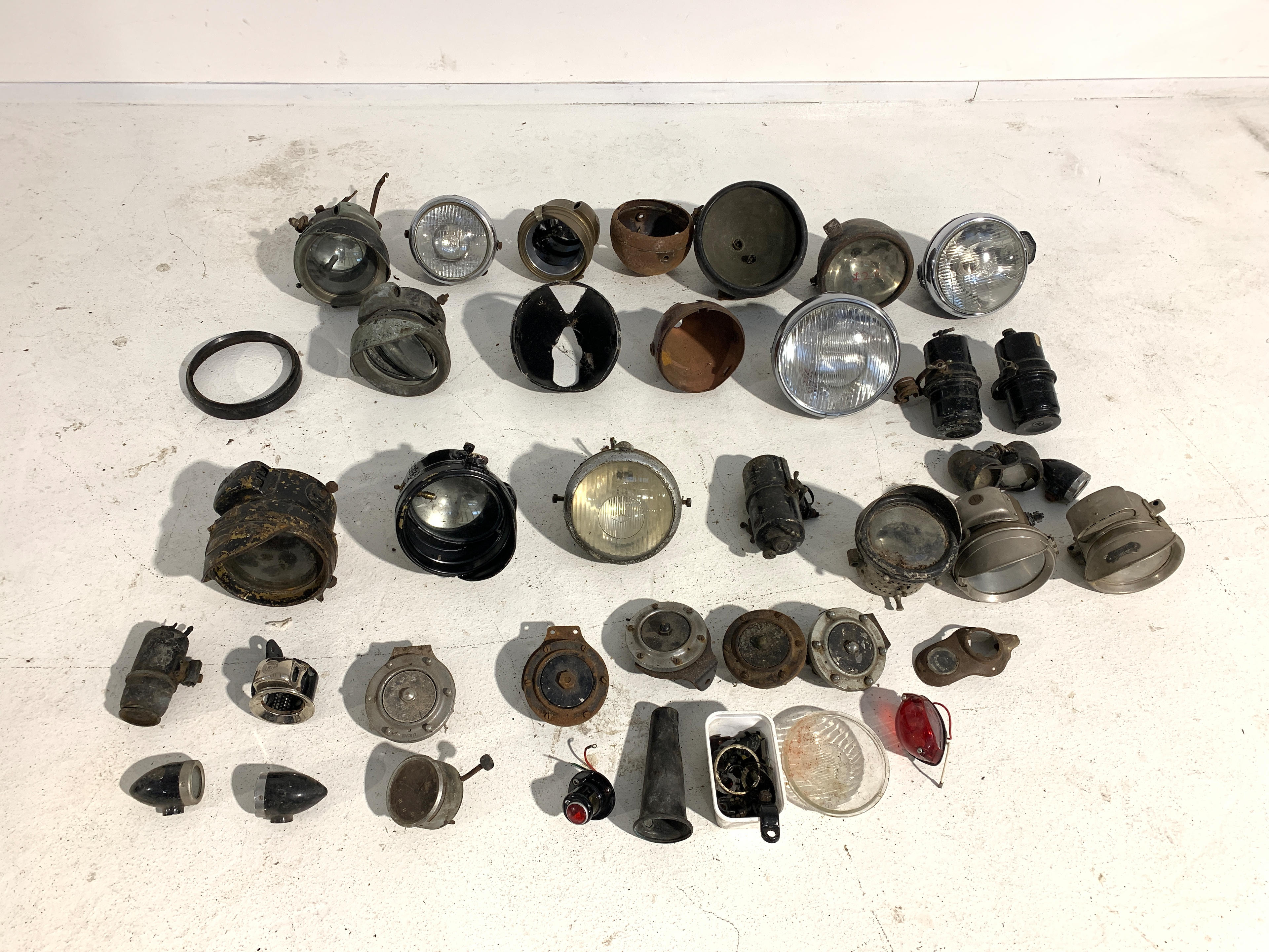 A QUANTITY OF ELECTRICAL AND ACETYLENE HEADLAMPS GENERATORS including headlamps