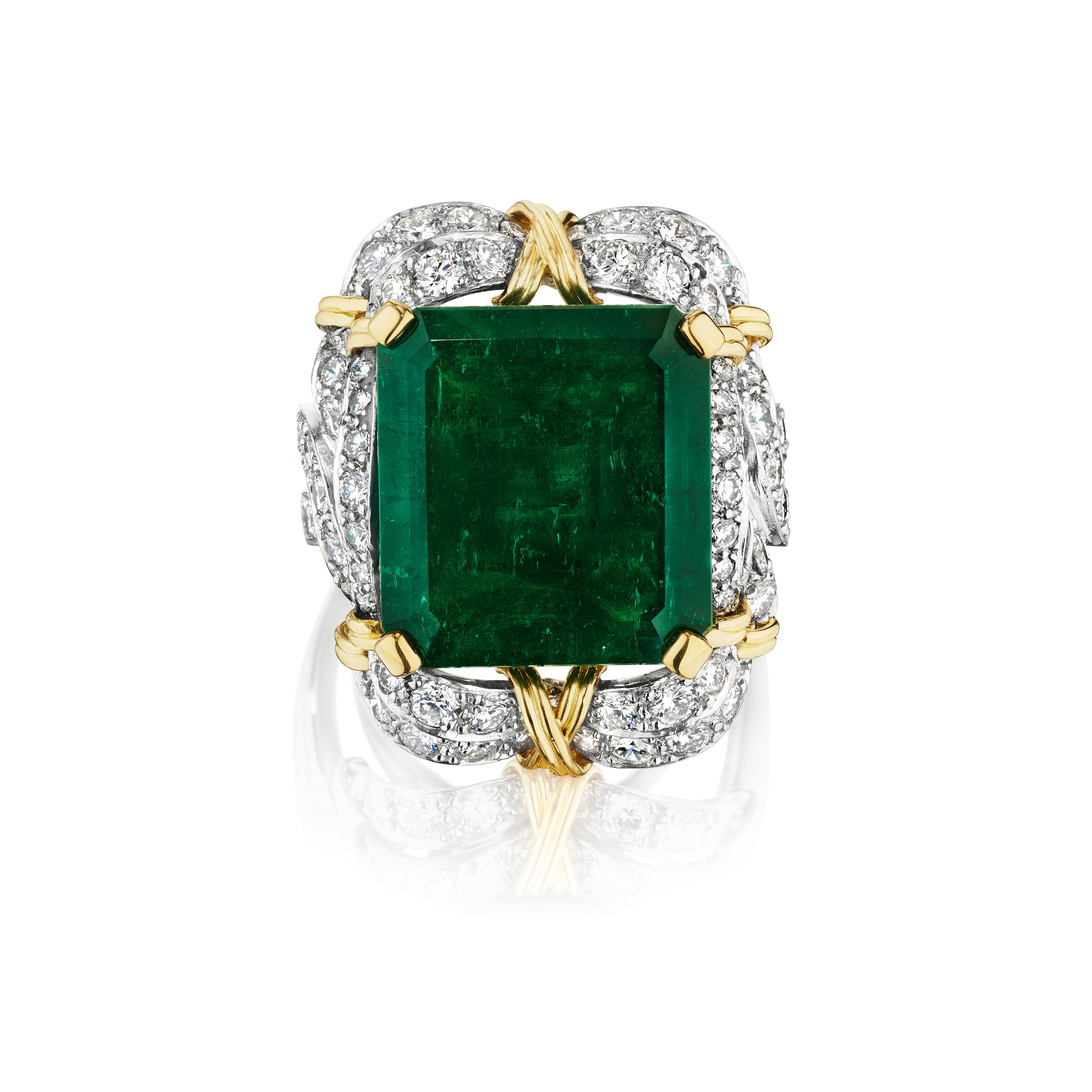 VERDURA AN EMERALD AND DIAMOND RING Centering a rectangular emerald
