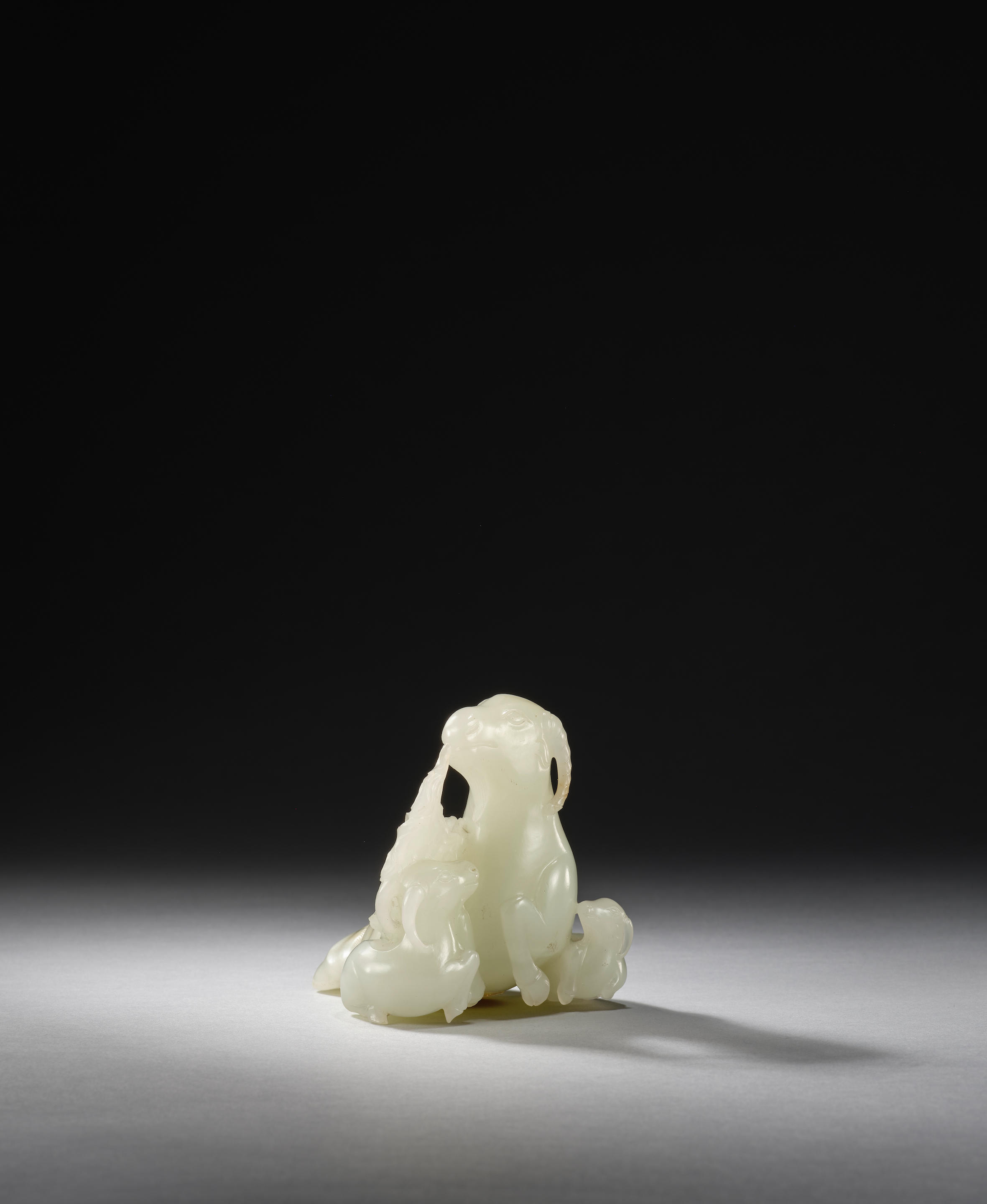 A WHITE JADE THREE RAMS GROUP 18th century Delicately carved