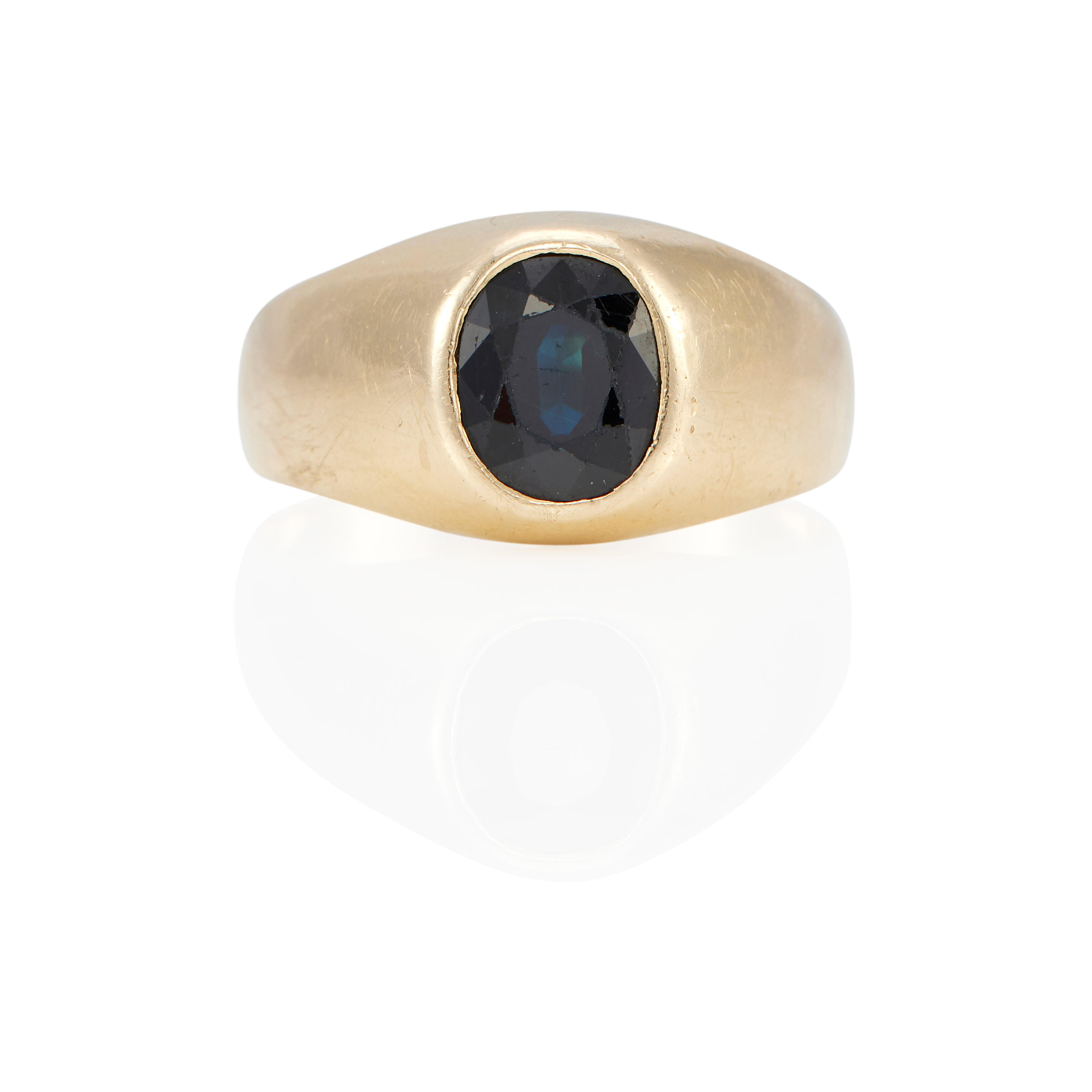 A 14K GOLD AND SAPPHIRE RING 14k yellow gold 1