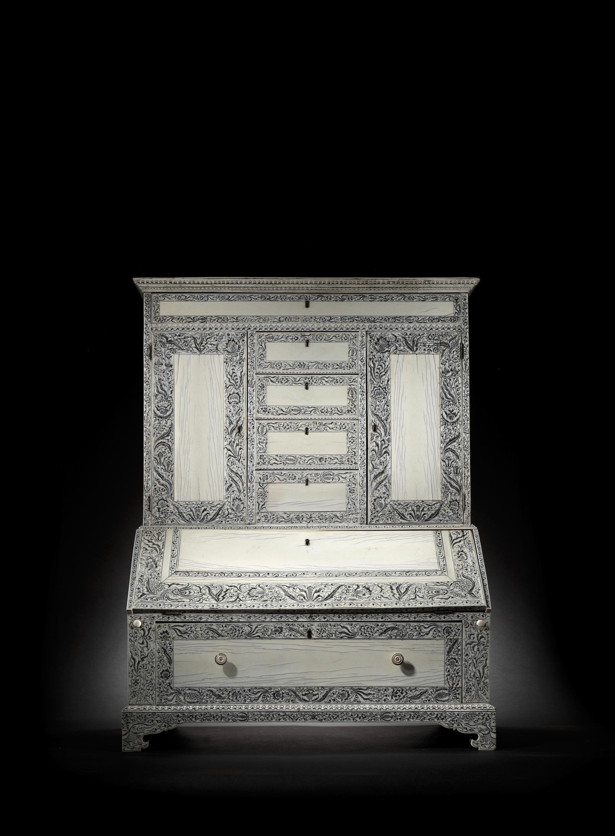 A VIZAGAPATAM ENGRAVED IVORY MOUNTED SANDALWOOD BUREAU CABINET SOUTH INDIA