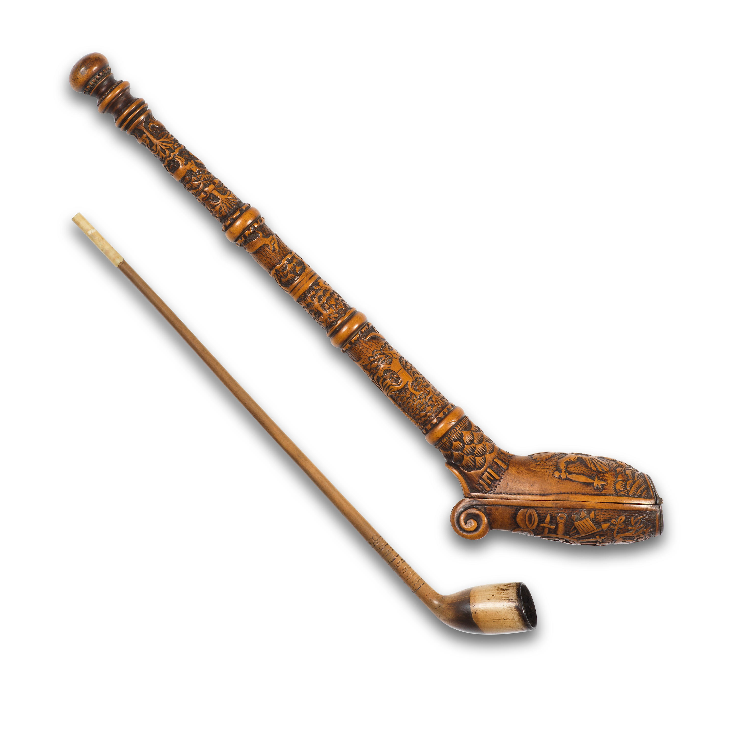 AN AUSTRIAN CARVED WALNUT PIPE CASE AND CLAY PIPE CIRCA