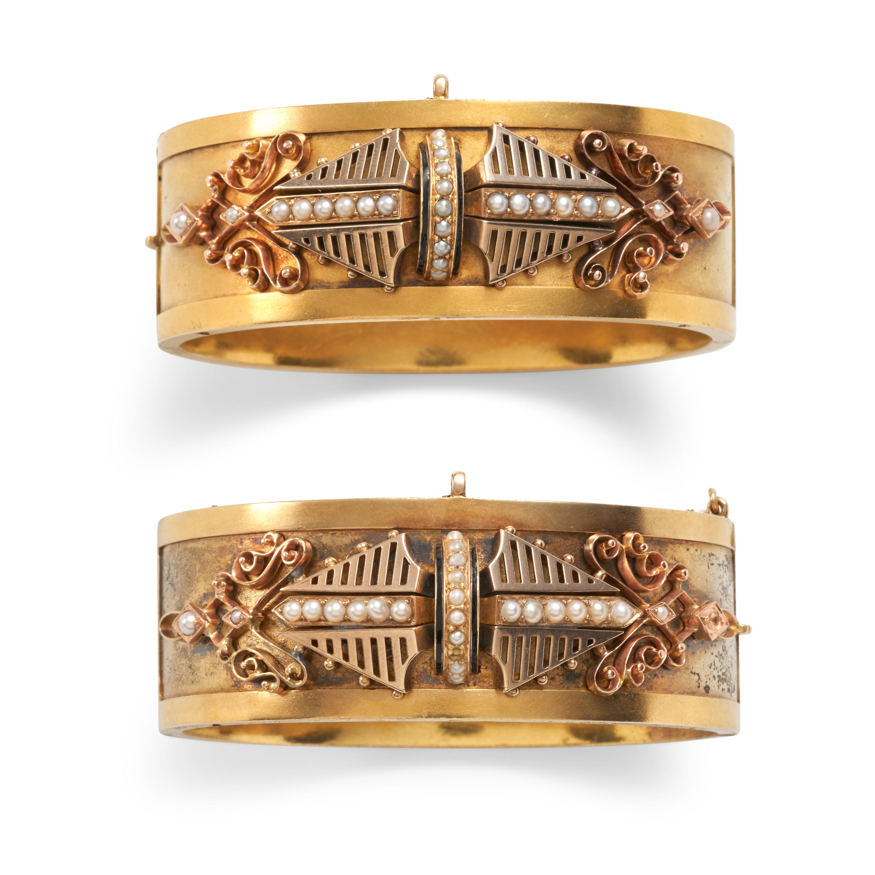 A PAIR OF VICTORIAN GOLD AND SEED PEARL BANGLE BRACELETS