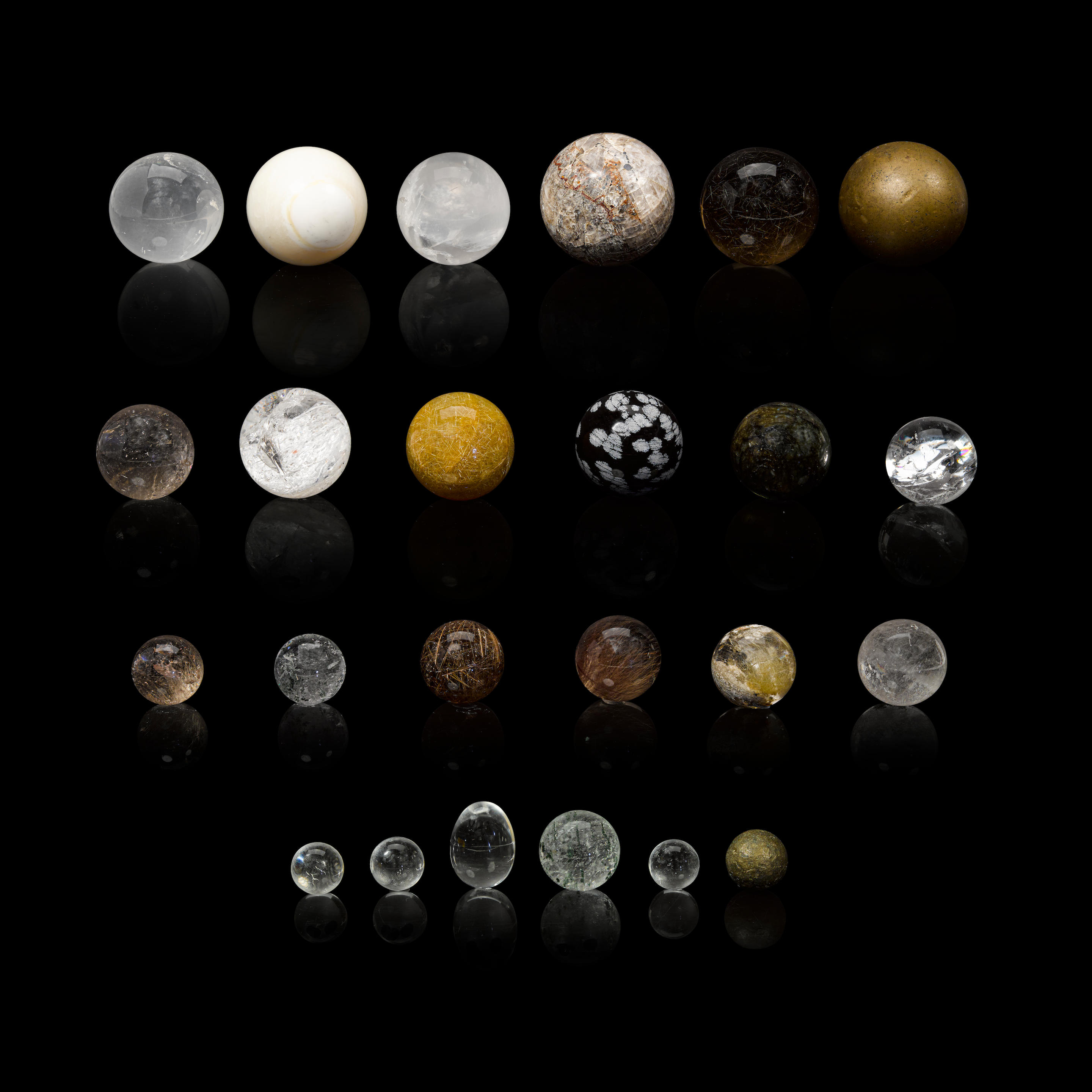 GROUP OF QUARTZ AND OTHER MINERAL SPHERES Including a labradorite