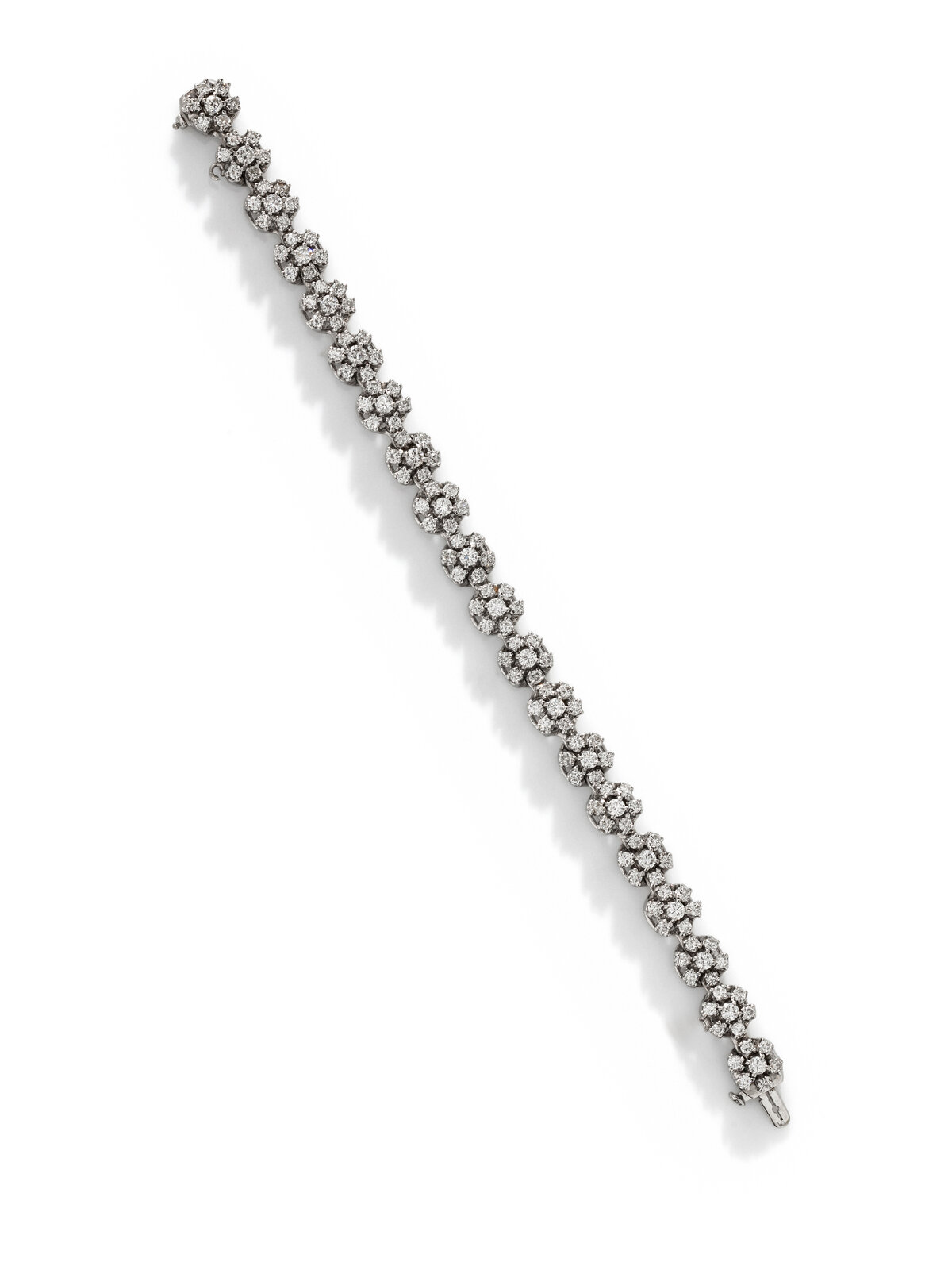 WHITE GOLD AND DIAMOND BRACELET Round brilliant cut diamonds weighing