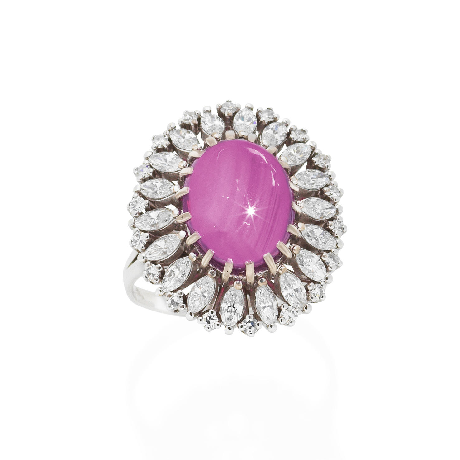 RUBY AND DIAMOND RING The cabochon ruby weighing 6 61