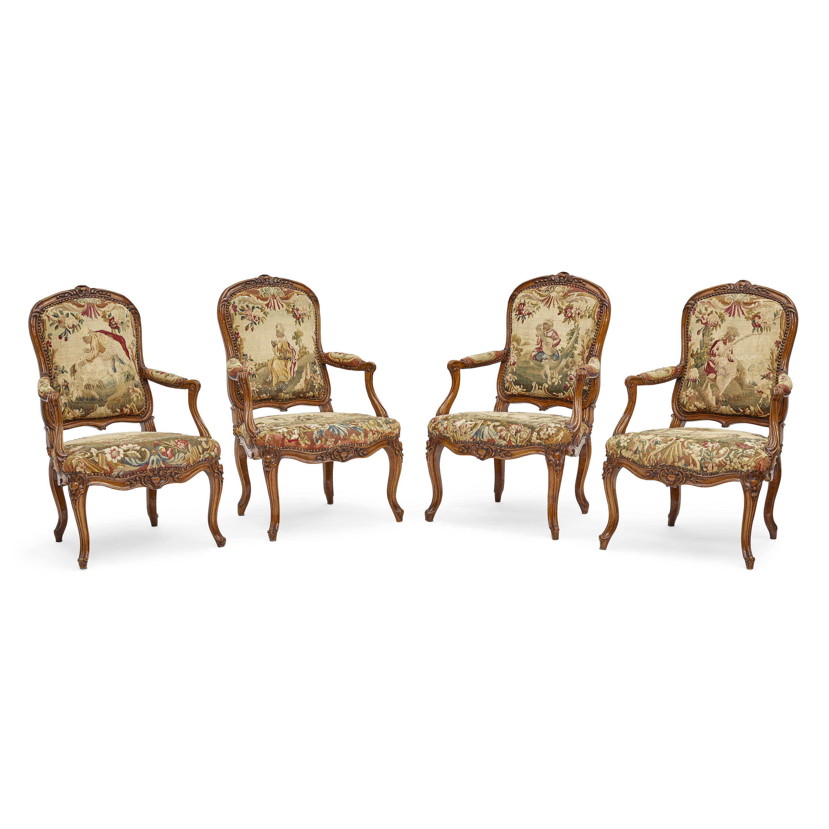 A SET OF FOUR LOUIS XV NEEDLEPOINT UPHOLSTERED FAUTEUILS 18th