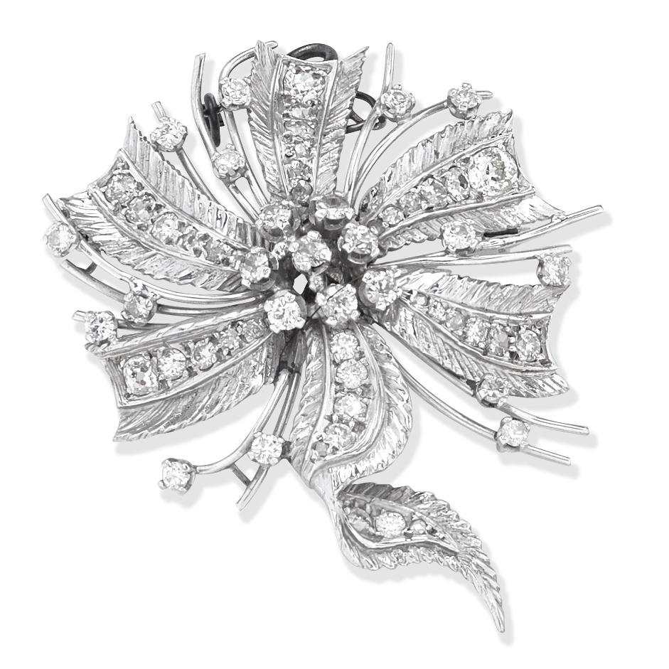 DIAMOND BROOCH MID 20TH CENTURY Of abstract foliate spray design